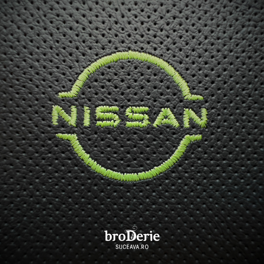Nissan logo brodat pe piele cu ata de culoare verde