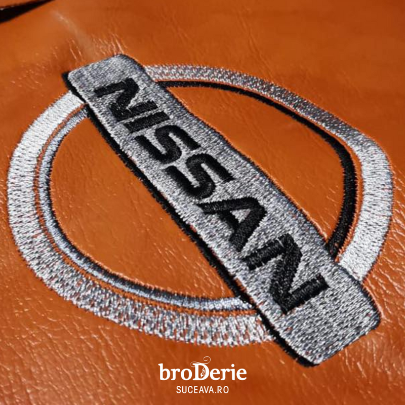 Logo Nissan brodat pe piele