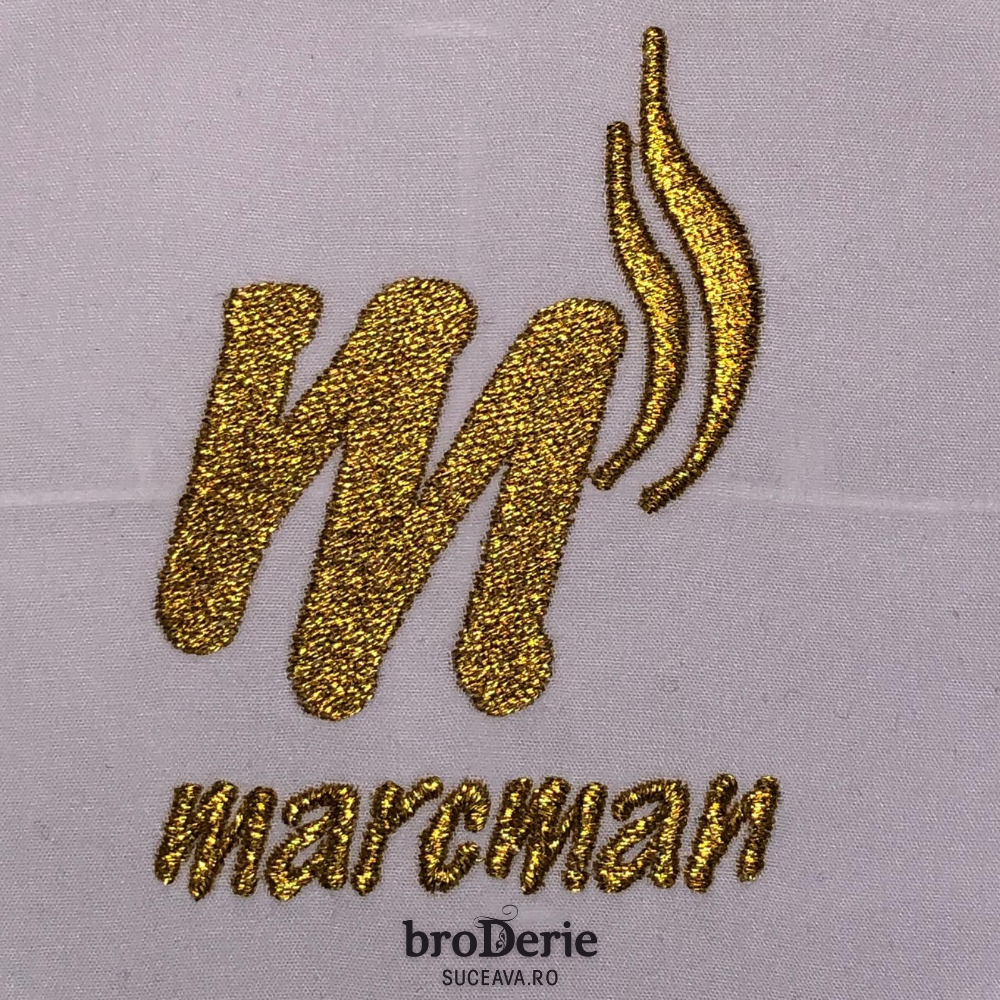 Logo brodat cu fir auriu Marcman